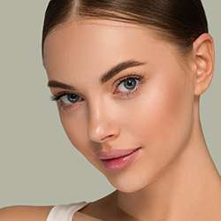 Woman with smooth skin and light makeup